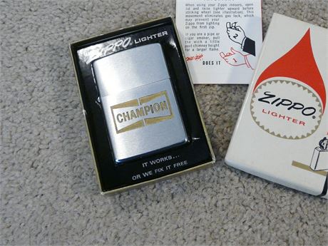 VINTAGE 1974 ZIPPO CIGARETTE  LIGHTER CHAMPION SPARK PLUGS BOXED VGC
