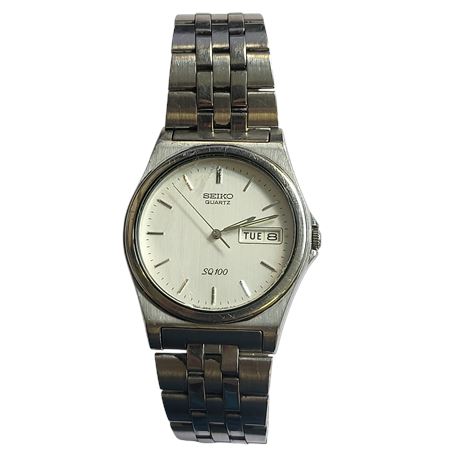 Vintage Seiko 7N43-8001 gents stainless wristwatch quartz movement Day/Dat GC